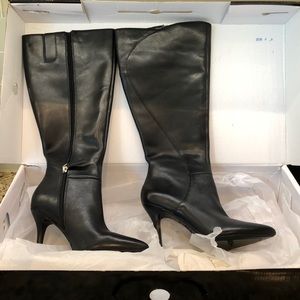 Knee high Nine West boots.